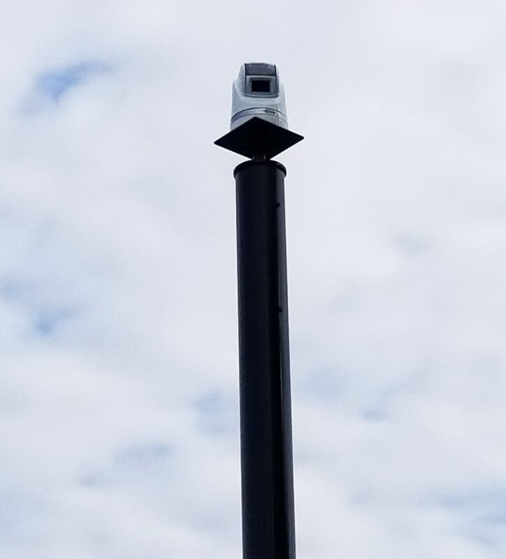 security camera poles with the ability to add lighting,