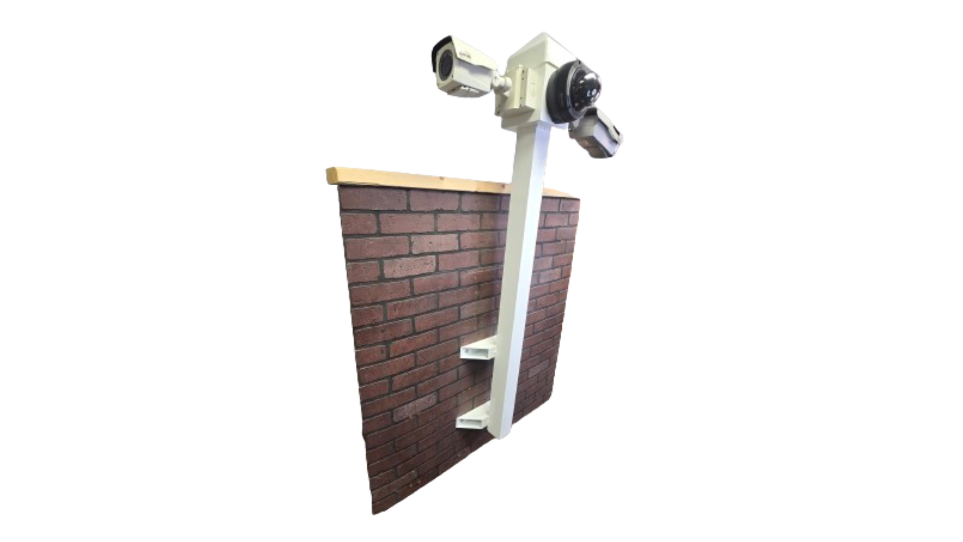 Building Mount Bullet Box attached to a brick wall with cameras mounted.