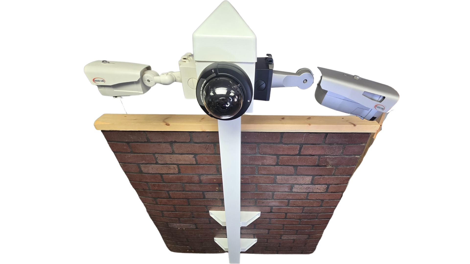 Building Mount Bullet Box attached to a brick wall with cameras mounted.